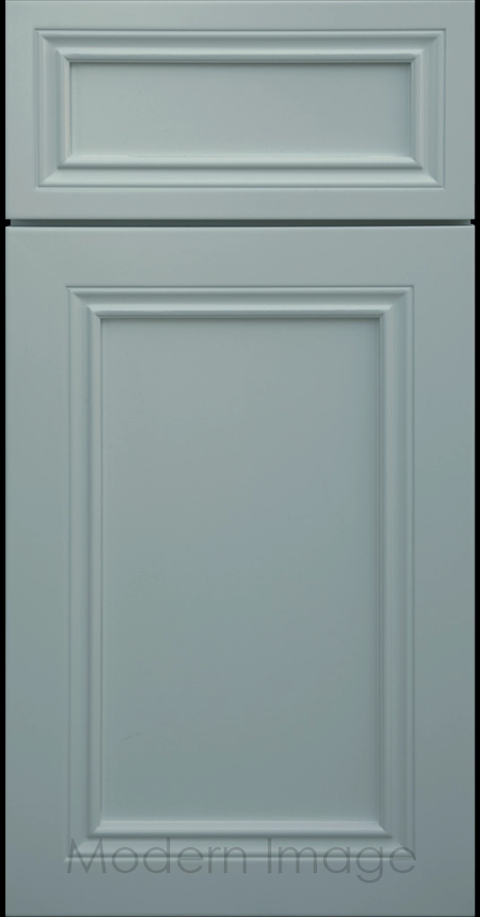 Close-up of Corona cabinets in Niebla Azul color with mitered molding and flat center panel.